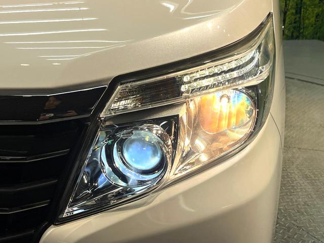 ノア ハイブリッドＧ　禁煙車　電動スライドドア　純正ナビ　後席モニター　バックカメラ　ドラレコ　ＥＴＣ　スマートキー　ＨＩＤヘッド　ビルトイン　クルコン　オートライト　デュアルエアコン　ＤＶＤ再生（30枚目）