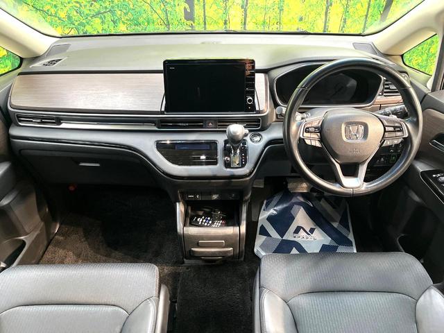 オデッセイ アブソルート 禁煙車 両側電動スライドドア フリップダウンモニター 純正10インチナビ 全周囲カメラ アダプティブクルーズ フルセグ ETC Bluetooth再生 パワーシート ハーフレザーシート オットマン(2枚目)