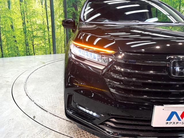 オデッセイ アブソルート 禁煙車 両側電動スライドドア フリップダウンモニター 純正10インチナビ 全周囲カメラ アダプティブクルーズ フルセグ ETC Bluetooth再生 パワーシート ハーフレザーシート オットマン(13枚目)