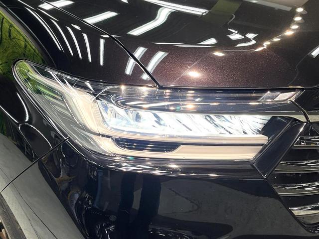 オデッセイ アブソルート 禁煙車 両側電動スライドドア フリップダウンモニター 純正10インチナビ 全周囲カメラ アダプティブクルーズ フルセグ ETC Bluetooth再生 パワーシート ハーフレザーシート オットマン(25枚目)