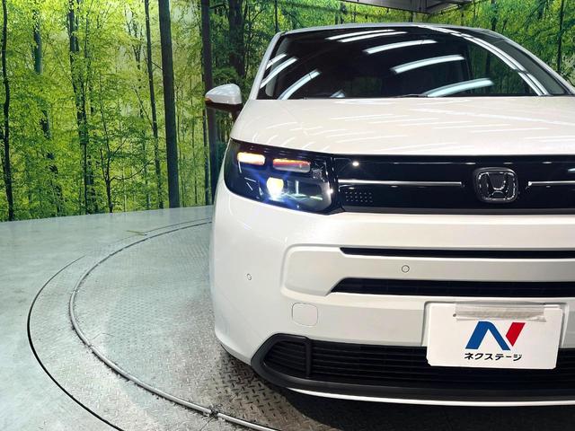 フリード エアー 登録済未使用車 両側電動ドア バックカメラ ホンダセンシング レーダークルーズ コーナーセンサー 純正8型ディスプレイオーディオ スマートキー LEDヘッド オートハイビーム オートエアコン(13枚目)