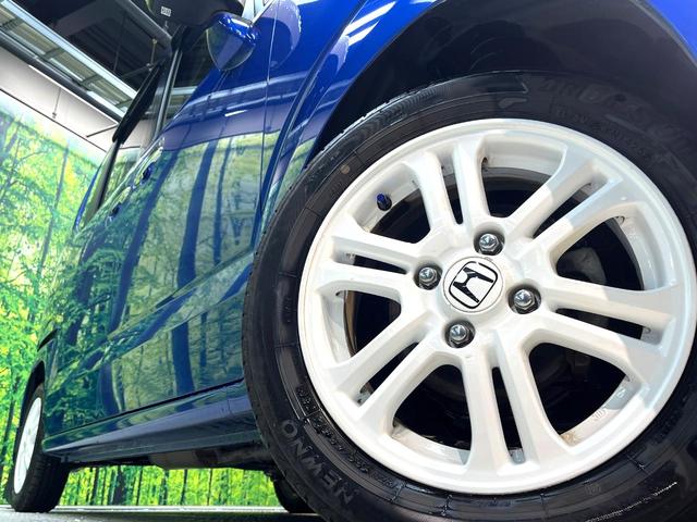 Ｎ－ＢＯＸ ２トーンカラースタイル　Ｇ・Ｌパッケージ　禁煙車　電動スライドドア　純正ナビ　バックカメラ　ＥＴＣ　Ｂｌｕｅｔｏｏｔｈ再生　スマートキー　２トーンカラー　純正１４インチアルミホイール　地デジ　プライバシーガラス　盗難防止装置　ベンチシート（13枚目）