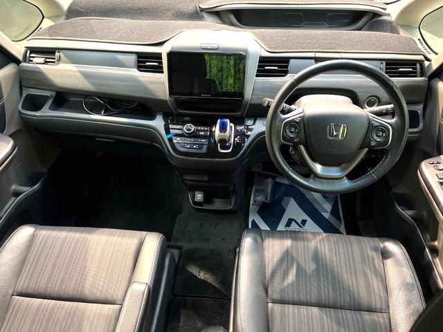 フリードハイブリッド ハイブリッド・ＥＸ　禁煙車　両側電動スライドドア　ホンダセンシング　アダプティブクルーズ　８インチナビ　バックカメラ　フルセグ　ドライブレコーダー　ＥＴＣ２．０　Ｂｌｕｅｔｏｏｔｈ再生　シートヒーター　ハーフレザーシート（2枚目）