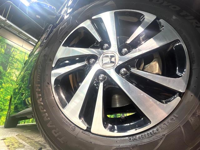 フリードハイブリッド ハイブリッド・ＥＸ　禁煙車　両側電動スライドドア　ホンダセンシング　アダプティブクルーズ　８インチナビ　バックカメラ　フルセグ　ドライブレコーダー　ＥＴＣ２．０　Ｂｌｕｅｔｏｏｔｈ再生　シートヒーター　ハーフレザーシート（14枚目）