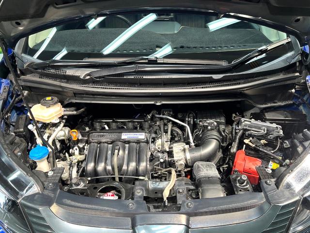 フリードハイブリッド ハイブリッド・ＥＸ　禁煙車　両側電動スライドドア　ホンダセンシング　アダプティブクルーズ　８インチナビ　バックカメラ　フルセグ　ドライブレコーダー　ＥＴＣ２．０　Ｂｌｕｅｔｏｏｔｈ再生　シートヒーター　ハーフレザーシート（19枚目）