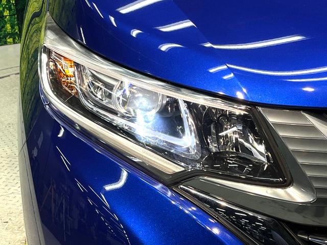 フリードハイブリッド ハイブリッド・ＥＸ　禁煙車　両側電動スライドドア　ホンダセンシング　アダプティブクルーズ　８インチナビ　バックカメラ　フルセグ　ドライブレコーダー　ＥＴＣ２．０　Ｂｌｕｅｔｏｏｔｈ再生　シートヒーター　ハーフレザーシート（25枚目）