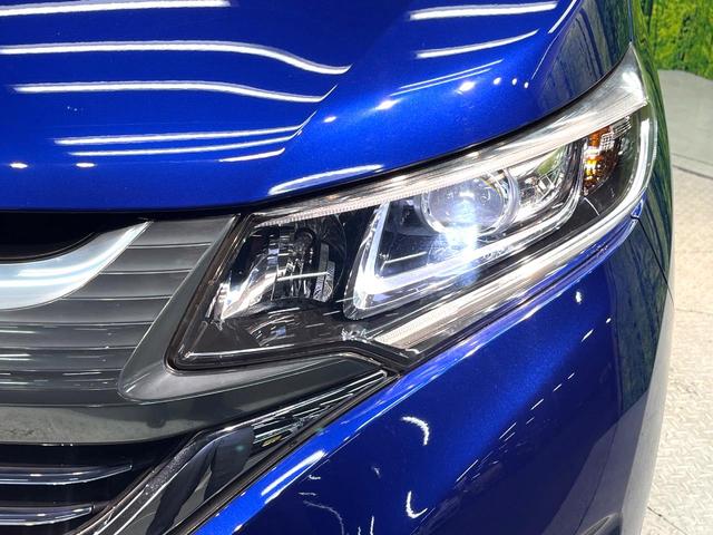 フリードハイブリッド ハイブリッド・ＥＸ　禁煙車　両側電動スライドドア　ホンダセンシング　アダプティブクルーズ　８インチナビ　バックカメラ　フルセグ　ドライブレコーダー　ＥＴＣ２．０　Ｂｌｕｅｔｏｏｔｈ再生　シートヒーター　ハーフレザーシート（26枚目）
