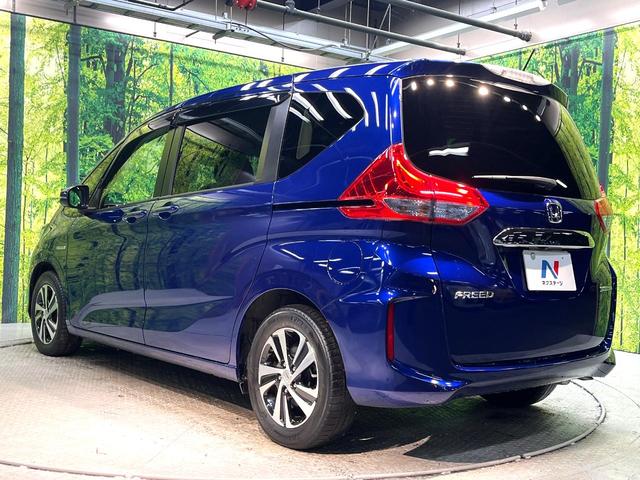 フリードハイブリッド ハイブリッド・ＥＸ　禁煙車　両側電動スライドドア　ホンダセンシング　アダプティブクルーズ　８インチナビ　バックカメラ　フルセグ　ドライブレコーダー　ＥＴＣ２．０　Ｂｌｕｅｔｏｏｔｈ再生　シートヒーター　ハーフレザーシート（31枚目）