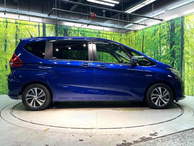 フリードハイブリッド ハイブリッド・ＥＸ　禁煙車　両側電動スライドドア　ホンダセンシング　アダプティブクルーズ　８インチナビ　バックカメラ　フルセグ　ドライブレコーダー　ＥＴＣ２．０　Ｂｌｕｅｔｏｏｔｈ再生　シートヒーター　ハーフレザーシート（33枚目）