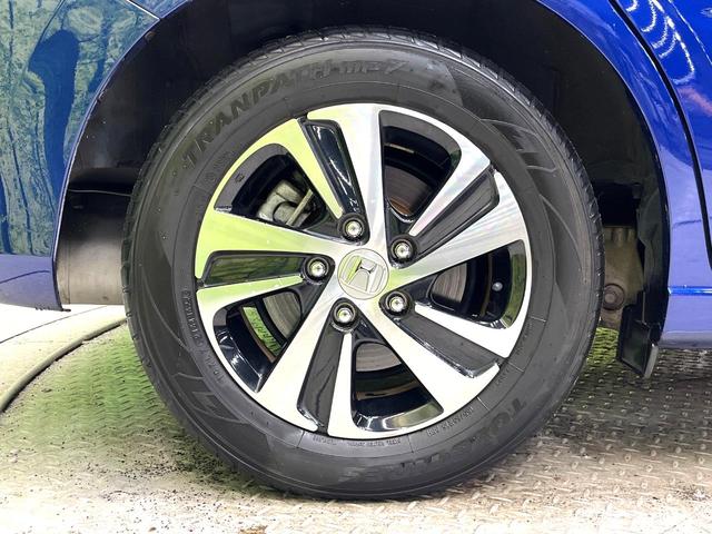 フリードハイブリッド ハイブリッド・ＥＸ　禁煙車　両側電動スライドドア　ホンダセンシング　アダプティブクルーズ　８インチナビ　バックカメラ　フルセグ　ドライブレコーダー　ＥＴＣ２．０　Ｂｌｕｅｔｏｏｔｈ再生　シートヒーター　ハーフレザーシート（35枚目）