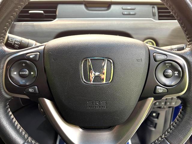 フリードハイブリッド ハイブリッド・ＥＸ　禁煙車　両側電動スライドドア　ホンダセンシング　アダプティブクルーズ　８インチナビ　バックカメラ　フルセグ　ドライブレコーダー　ＥＴＣ２．０　Ｂｌｕｅｔｏｏｔｈ再生　シートヒーター　ハーフレザーシート（64枚目）