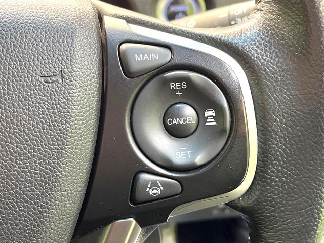 フリードハイブリッド ハイブリッド・ＥＸ　禁煙車　両側電動スライドドア　ホンダセンシング　アダプティブクルーズ　８インチナビ　バックカメラ　フルセグ　ドライブレコーダー　ＥＴＣ２．０　Ｂｌｕｅｔｏｏｔｈ再生　シートヒーター　ハーフレザーシート（65枚目）