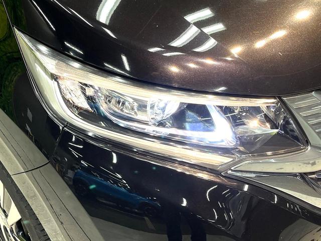 フリードハイブリッド ハイブリッド・ＥＸ　禁煙車　両側電動スライドドア　衝突軽減システム　アダプティブクルーズ　純正ナビ　バックカメラ　フルセグ　ＥＴＣ　Ｂｌｕｅｔｏｏｔｈ再生　ハーフレザーシート　シートヒーター　ＬＥＤヘッドライト（36枚目）