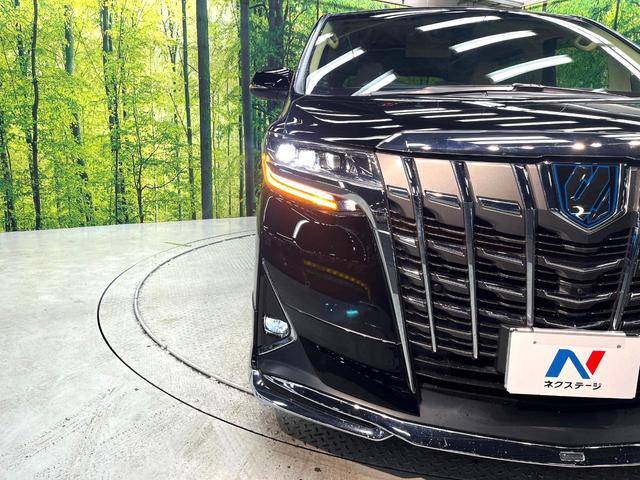 アルファードハイブリッド Ｇ　Ｆパッケージ　４ＷＤ　サンルーフ　モデリスタフルエアロ　両側電動ドア　後席モニター　純正１０．５型ナビ　全周囲カメラ　ＪＢＬサウンド　１００Ｖ電源　衝突被害軽減システム　レーダークルーズ　禁煙車　電動リアゲート（13枚目）