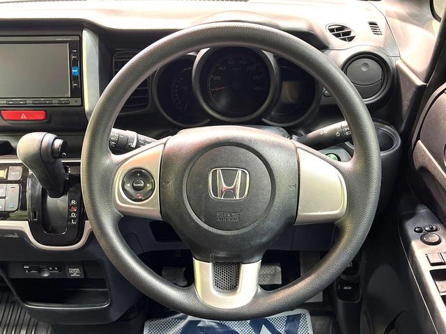 Ｎ－ＢＯＸ Ｇ・Ｌパッケージ　禁煙車　電動スライドドア　純正ナビ　バックカメラ　フルセグ　ドライブレコーダー　ＥＴＣ　Ｂｌｕｅｔｏｏｔｈ再生　スマートキー　ＣＤ／ＤＶＤ再生　プライバシーガラス　盗難防止装置　横滑り防止装置（11枚目）