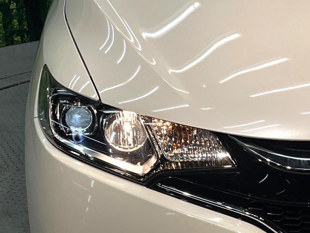 フィット １３Ｇ・Ｌパッケージ　ファインエディション　禁煙車　衝突軽減システム　バックカメラ　ディスプレイオーディオ　ＬＥＤヘッド　ハーフレザー　クルーズコントロール　スマートキー　地デジ　ＣＤ再生　プライバシーガラス　盗難防止装置　アイドリングストップ（30枚目）