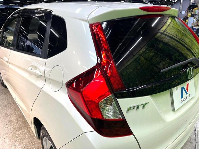 フィット １３Ｇ・Ｌパッケージ　ファインエディション　禁煙車　衝突軽減システム　バックカメラ　ディスプレイオーディオ　ＬＥＤヘッド　ハーフレザー　クルーズコントロール　スマートキー　地デジ　ＣＤ再生　プライバシーガラス　盗難防止装置　アイドリングストップ（32枚目）