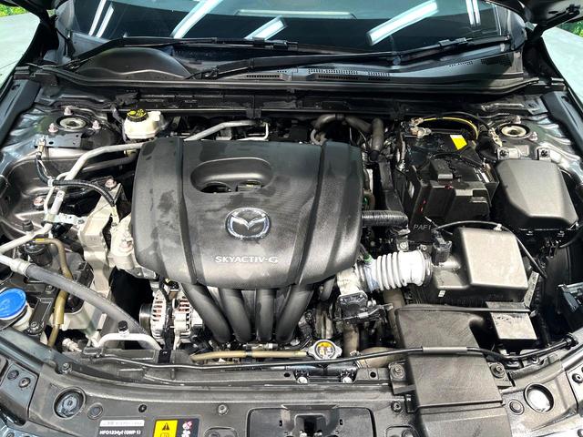 MAZDA3ファストバック 15Sツーリング 禁煙車 純正SDナビ 全周囲カメラ 衝突被害軽減システム レーダークルーズ ドラレコ コーナーセンサー スマートキー LEDヘッド ビルトインETC 純正18インチアルミ オートハイビーム(18枚目)