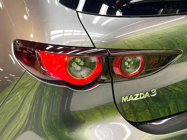 MAZDA3ファストバック 15Sツーリング 禁煙車 純正SDナビ 全周囲カメラ 衝突被害軽減システム レーダークルーズ ドラレコ コーナーセンサー スマートキー LEDヘッド ビルトインETC 純正18インチアルミ オートハイビーム(34枚目)