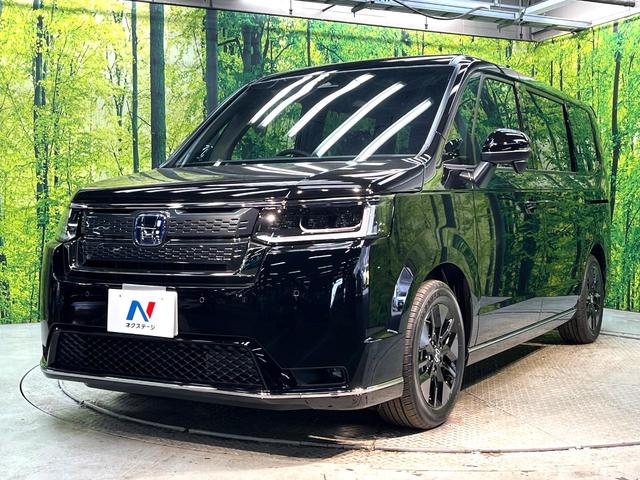 ステップワゴン ｅ：ＨＥＶスパーダ　登録済未使用車　両側電動ドア　衝突被害軽減システム　レーダークルーズ　電動リアゲート　コーナーセンサー　シートヒーター　スマートキー　ＬＥＤヘッド　純正１６インチアルミ　ハーフレザーシート（27枚目）