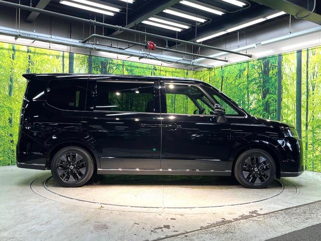 ステップワゴン ｅ：ＨＥＶスパーダ　登録済未使用車　両側電動ドア　衝突被害軽減システム　レーダークルーズ　電動リアゲート　コーナーセンサー　シートヒーター　スマートキー　ＬＥＤヘッド　純正１６インチアルミ　ハーフレザーシート（30枚目）