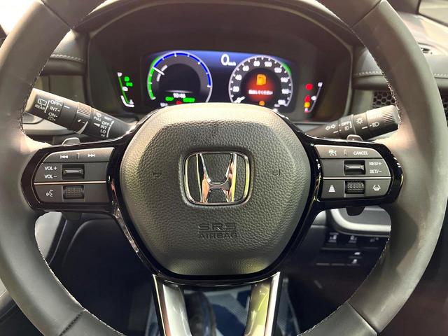 ステップワゴン ｅ：ＨＥＶスパーダ　登録済未使用車　両側電動ドア　衝突被害軽減システム　レーダークルーズ　電動リアゲート　コーナーセンサー　シートヒーター　スマートキー　ＬＥＤヘッド　純正１６インチアルミ　ハーフレザーシート（52枚目）