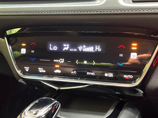 ヴェゼル ハイブリッドＺ・ホンダセンシング　禁煙車　純正ナビ　バックカメラ　衝突被害軽減システム　ハーフレザーシート　ドラレコ　スマートキー　ＬＥＤヘッド　ビルトインＥＴＣ　車線逸脱警報　オートライト　デュアルエアコン　ＣＤ（6枚目）