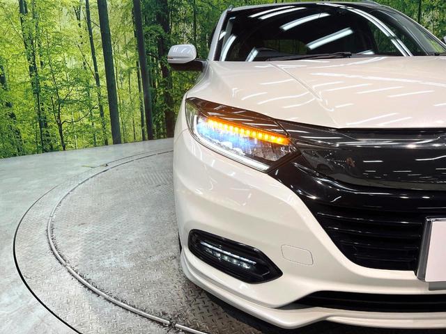 ヴェゼル ハイブリッドＺ・ホンダセンシング　禁煙車　純正ナビ　バックカメラ　衝突被害軽減システム　ハーフレザーシート　ドラレコ　スマートキー　ＬＥＤヘッド　ビルトインＥＴＣ　車線逸脱警報　オートライト　デュアルエアコン　ＣＤ（12枚目）