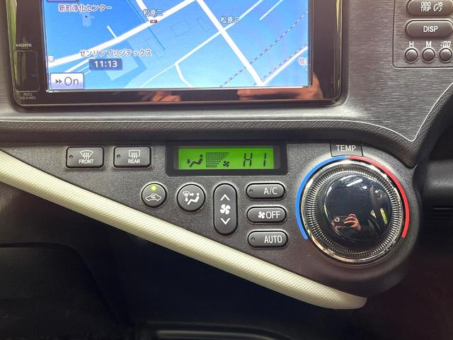アクア S 禁煙車 純正ナビ フルセグ Bluetooth再生 スマートキー 純正15インチアルミホイール オートライト オートエアコン 盗難防止装置 プライバシーガラス トラクションコントロール 電動格納ミラー(4枚目)