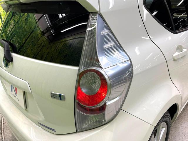 アクア S 禁煙車 純正ナビ フルセグ Bluetooth再生 スマートキー 純正15インチアルミホイール オートライト オートエアコン 盗難防止装置 プライバシーガラス トラクションコントロール 電動格納ミラー(32枚目)