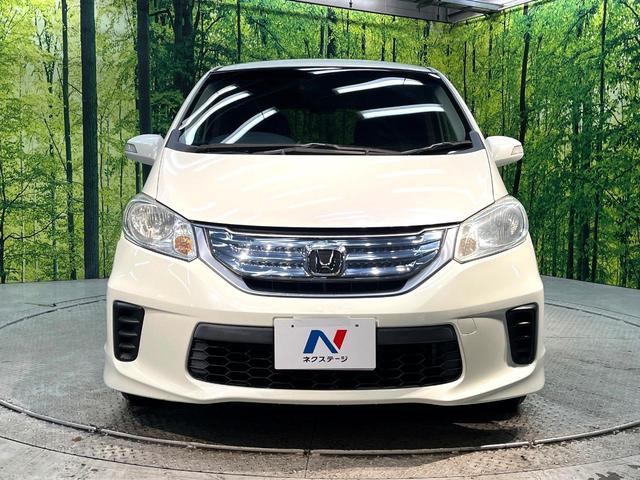 フリードハイブリッド ジャストセレクション　禁煙車　後席モニター　両側電動スライドドア　ナビ　バックカメラ　ＥＴＣ　Ｂｌｕｅｔｏｏｔｈ再生　ハーフレザーシート　ＨＩＤヘッドライト　クルーズコントロール　スマートキー　地デジ　盗難防止装置（14枚目）