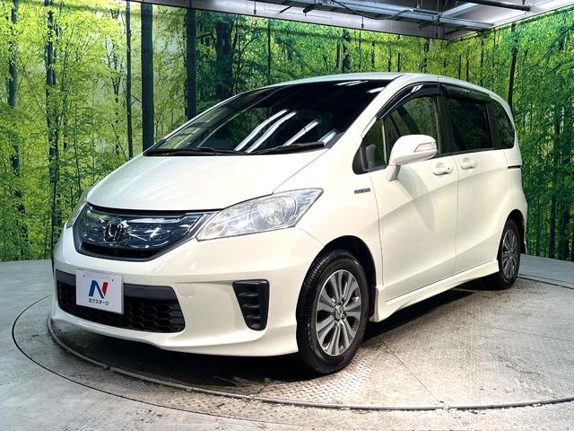 フリードハイブリッド ジャストセレクション　禁煙車　後席モニター　両側電動スライドドア　ナビ　バックカメラ　ＥＴＣ　Ｂｌｕｅｔｏｏｔｈ再生　ハーフレザーシート　ＨＩＤヘッドライト　クルーズコントロール　スマートキー　地デジ　盗難防止装置（21枚目）