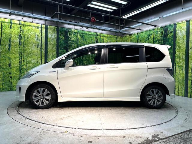 フリードハイブリッド ジャストセレクション　禁煙車　後席モニター　両側電動スライドドア　ナビ　バックカメラ　ＥＴＣ　Ｂｌｕｅｔｏｏｔｈ再生　ハーフレザーシート　ＨＩＤヘッドライト　クルーズコントロール　スマートキー　地デジ　盗難防止装置（22枚目）