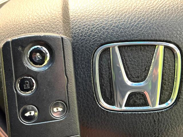 フリードハイブリッド ジャストセレクション　禁煙車　後席モニター　両側電動スライドドア　ナビ　バックカメラ　ＥＴＣ　Ｂｌｕｅｔｏｏｔｈ再生　ハーフレザーシート　ＨＩＤヘッドライト　クルーズコントロール　スマートキー　地デジ　盗難防止装置（40枚目）