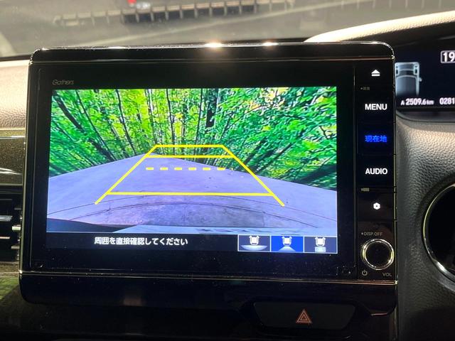 N-BOXカスタム G・Lホンダセンシング 両側電動ドア 純正8型ナビ バックカメラ ホンダセンシング レーダークルーズ 禁煙車 ドラレコ スマートキー LEDヘッド ETC 純正14インチアルミ 車線逸脱警報 オートライト オートエアコン(4枚目)