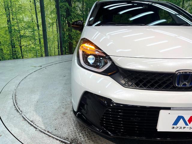 フィット ｅ：ＨＥＶ　ＲＳ　禁煙車　ホンダセンシング　アダプティブクルーズ　９型ホンダコネクト　バックカメラ　フルセグ　ドライブレコーダー　ＥＴＣ２．０　Ｂｌｕｅｔｏｏｔｈ　ハーフレザーシート　ＬＥＤヘッド　クリアランスソナー（12枚目）