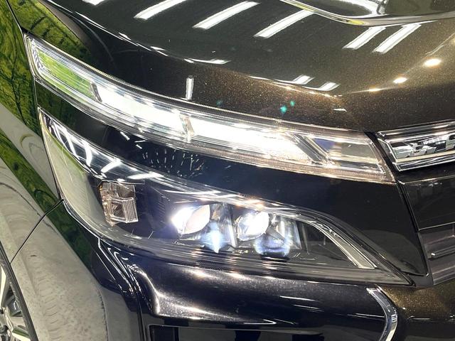 ヴォクシー ＺＳ　煌ＩＩＩ　禁煙車　両側電動スライドドア　純正ＳＤナビ　後席モニター　衝突被害軽減システム　ハーフレザーシート　ドラレコ　コーナーセンサー　スマートキー　ＬＥＤヘッド　ＥＴＣ　クルコン（29枚目）