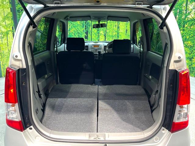 ワゴンＲ ＦＸリミテッド　禁煙車　スマートキー　オーディオ　エアコン　ＣＤ再生　プライバシーガラス　盗難防止システム　ベンチシート　シートアンダートレイ　電動格納ミラー　バニティミラー　１４インチアルミホイール（10枚目）