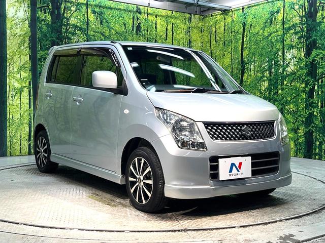 ワゴンＲ ＦＸリミテッド　禁煙車　スマートキー　オーディオ　エアコン　ＣＤ再生　プライバシーガラス　盗難防止システム　ベンチシート　シートアンダートレイ　電動格納ミラー　バニティミラー　１４インチアルミホイール（16枚目）