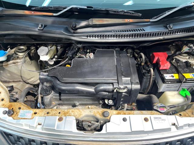 ワゴンＲ ＦＸリミテッド　禁煙車　スマートキー　オーディオ　エアコン　ＣＤ再生　プライバシーガラス　盗難防止システム　ベンチシート　シートアンダートレイ　電動格納ミラー　バニティミラー　１４インチアルミホイール（18枚目）