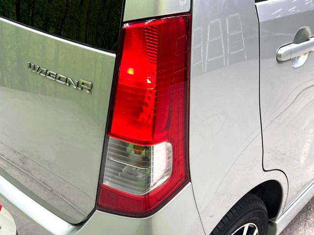 ワゴンＲ ＦＸリミテッド　禁煙車　スマートキー　オーディオ　エアコン　ＣＤ再生　プライバシーガラス　盗難防止システム　ベンチシート　シートアンダートレイ　電動格納ミラー　バニティミラー　１４インチアルミホイール（28枚目）