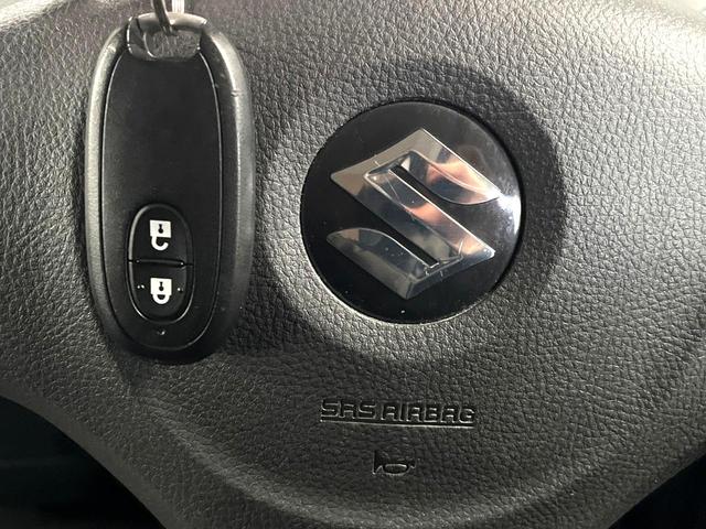 ワゴンＲ ＦＸリミテッド　禁煙車　スマートキー　オーディオ　エアコン　ＣＤ再生　プライバシーガラス　盗難防止システム　ベンチシート　シートアンダートレイ　電動格納ミラー　バニティミラー　１４インチアルミホイール（36枚目）