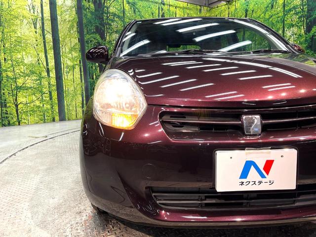 パッソ Ｘ　ユルリ　禁煙車　純正ナビ　ＥＴＣ　スマートキー　盗難防止装置　プライバシーガラス　ＣＤ／ＤＶＤ再生　電動格納ドアミラー　トラクションコントロール　ヘッドライトレベライザー　アームレスト（12枚目）