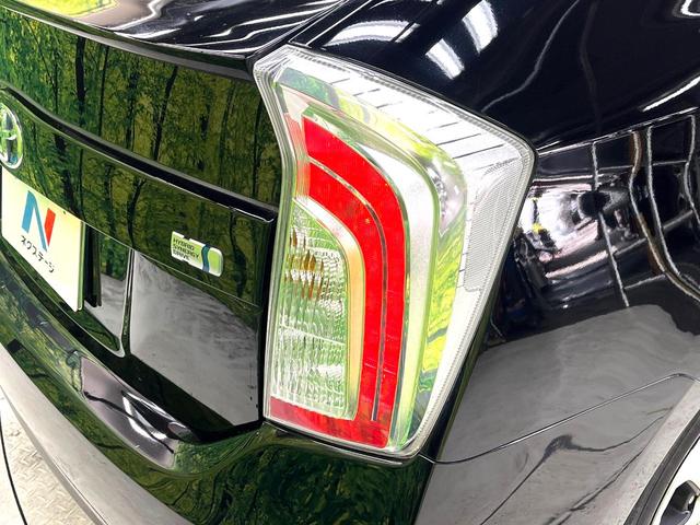 プリウス Ｓ　ＳＤナビ　禁煙車　スマートキー　ＨＩＤヘッド　オートライト　オートエアコン　Ｂｌｕｅｔｏｏｔｈ再生　ＣＤ／ＤＶＤ再生　地デジＴＶ　ステアリングスイッチ　横滑り防止装置　電動格納ドアミラー　盗難防止装置（28枚目）