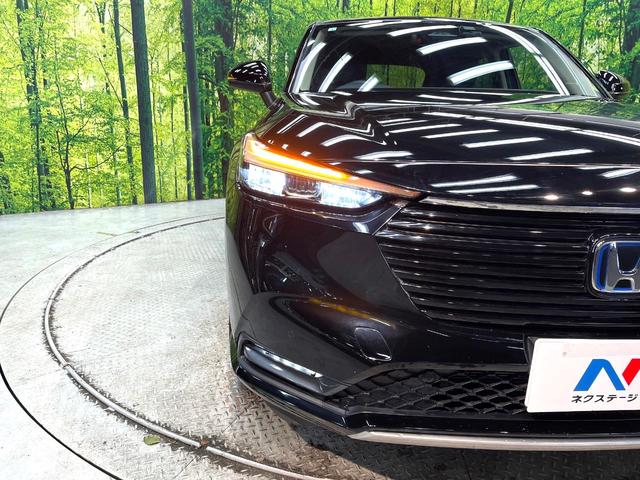 ヴェゼル ｅ：ＨＥＶ　Ｚ　禁煙車　純正８インチナビ　バックカメラ　衝突被害軽減システム　レーダークルーズ　電動リアゲート　ハーフレザーシート　ドライブレコーダー　コーナーセンサー　ＬＥＤヘッドライト　ＥＴＣ２．０　スマートキー（12枚目）