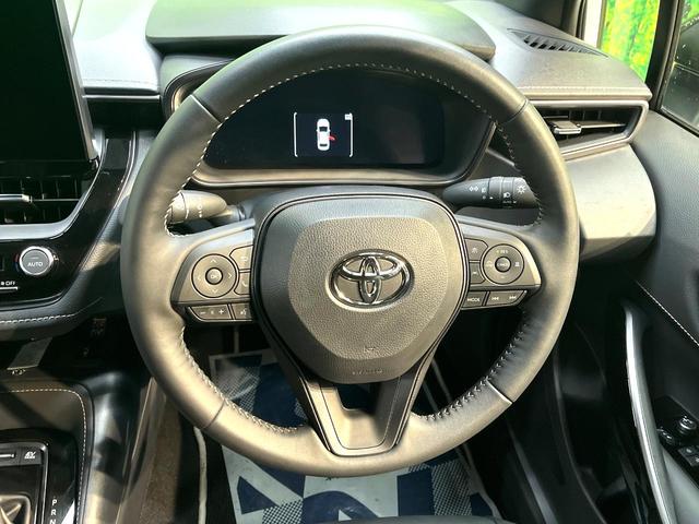 カローラ ハイブリッド　ダブルバイビー　純正１０．５インチナビ　バックカメラ　衝突軽減装置　レーダークルーズコントロール　禁煙車　ハーフレザーシート　コーナーセンサー　スマートキー　ブラインドスポットモニター　車線逸脱警報　ＥＴＣ（11枚目）