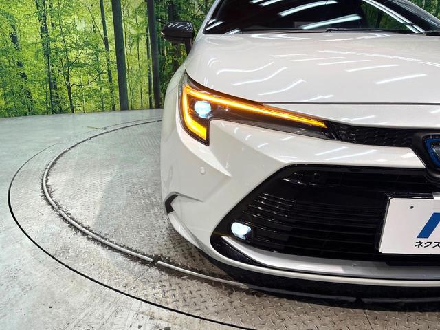 カローラ ハイブリッド　ダブルバイビー　純正１０．５インチナビ　バックカメラ　衝突軽減装置　レーダークルーズコントロール　禁煙車　ハーフレザーシート　コーナーセンサー　スマートキー　ブラインドスポットモニター　車線逸脱警報　ＥＴＣ（12枚目）