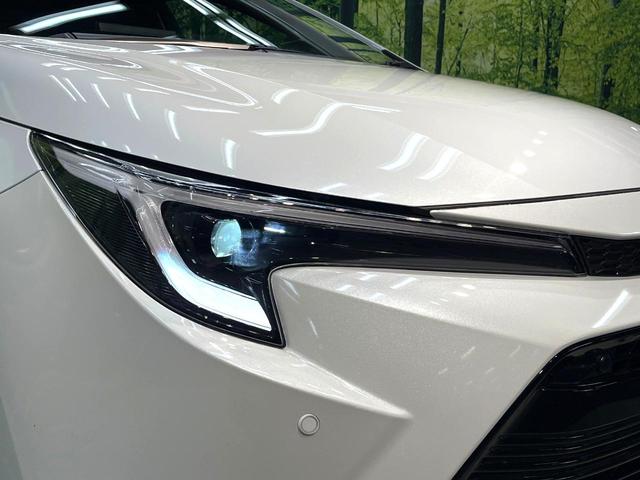 カローラ ハイブリッド　ダブルバイビー　純正１０．５インチナビ　バックカメラ　衝突軽減装置　レーダークルーズコントロール　禁煙車　ハーフレザーシート　コーナーセンサー　スマートキー　ブラインドスポットモニター　車線逸脱警報　ＥＴＣ（34枚目）