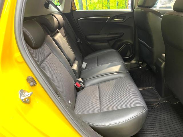 フィットハイブリッド Ｌ　ホンダセンシング　禁煙車　純正ＳＤナビ　バックカメラ　衝突被害軽減システム　ハーフレザーシート　スマートキー　ＬＥＤヘッド　ビルトインＥＴＣ　車線逸脱警報　オートライト　オートエアコン　Ｂｌｕｅｔｏｏｔｈ　ＣＤ（9枚目）