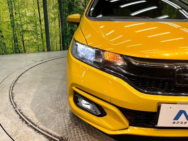 フィットハイブリッド Ｌ　ホンダセンシング　禁煙車　純正ＳＤナビ　バックカメラ　衝突被害軽減システム　ハーフレザーシート　スマートキー　ＬＥＤヘッド　ビルトインＥＴＣ　車線逸脱警報　オートライト　オートエアコン　Ｂｌｕｅｔｏｏｔｈ　ＣＤ（12枚目）